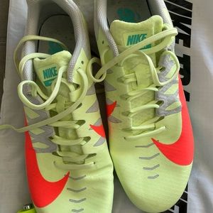 Men’s track and field cleats with spikes.